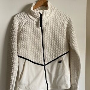 New balance white woman’s coat. Size m.